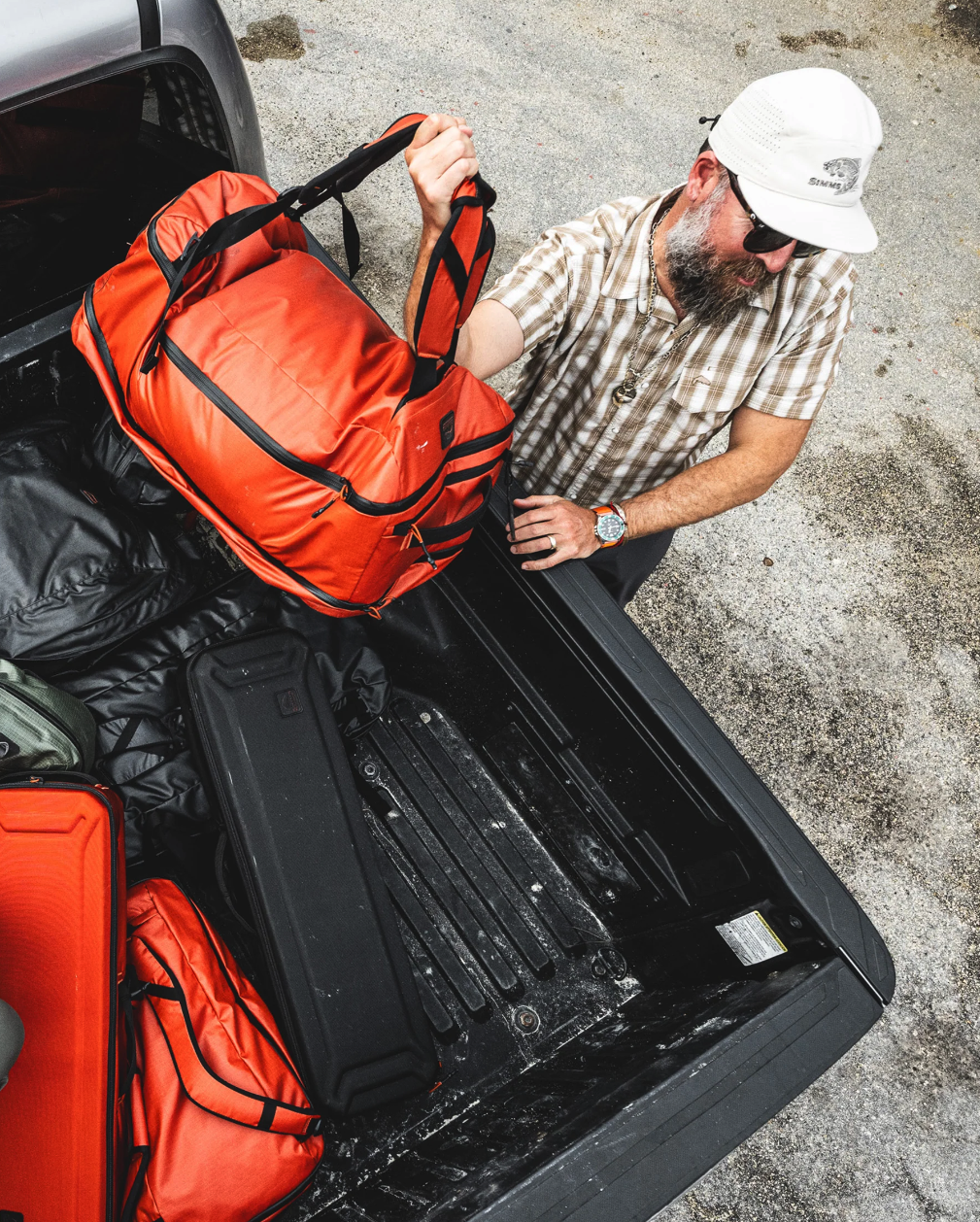High-capacity Simms Tailwind Duffel Bag with weather-resistant material