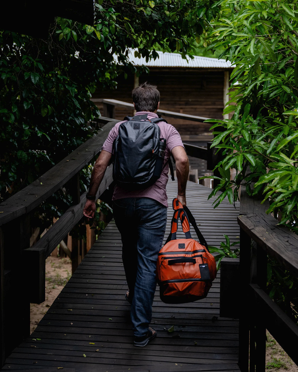 Versatile Simms Tailwind 80L Duffel Bag with easy-to-carry shoulder straps