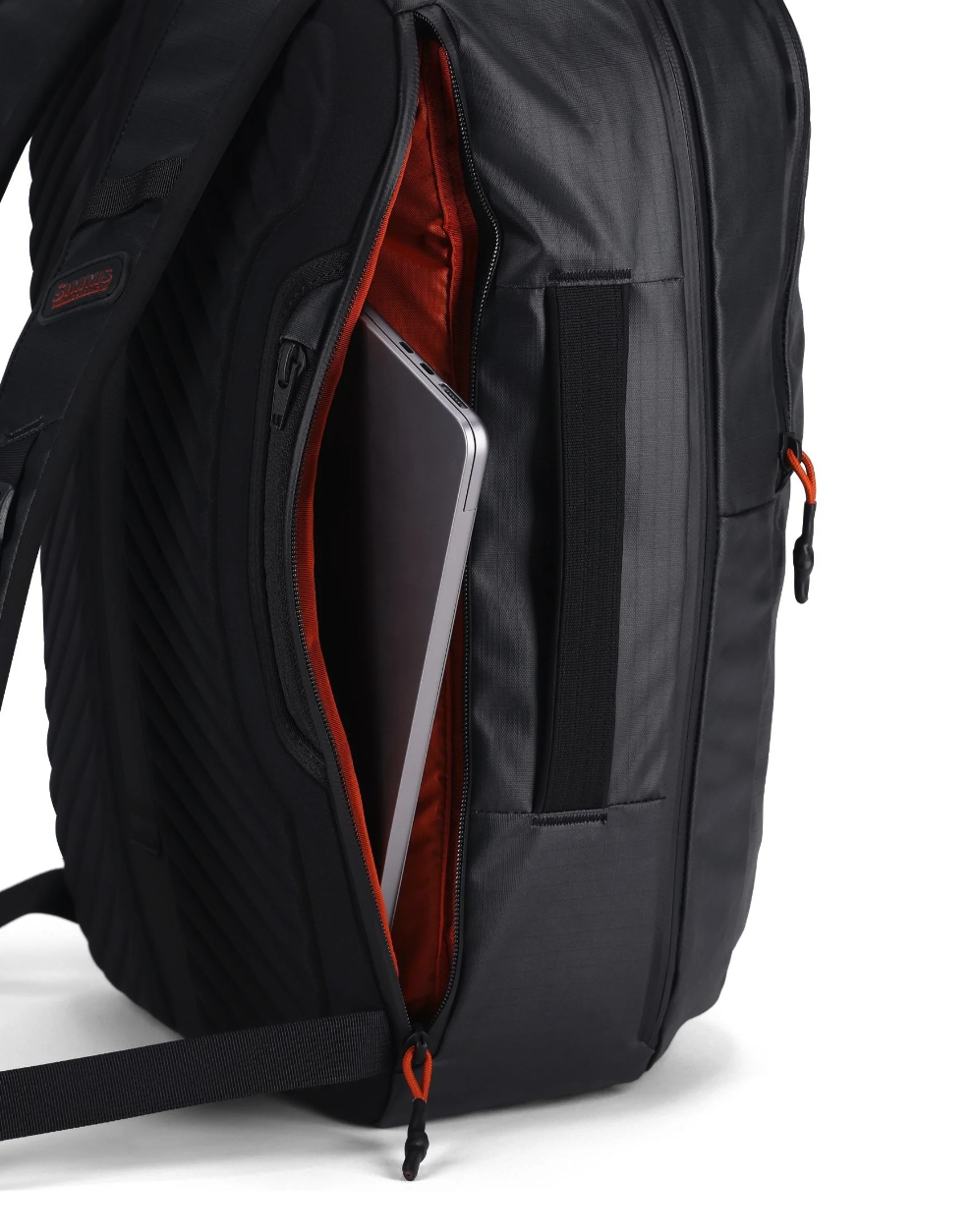 Protective Simms Tailwind Backpack with padded compartments for sensitive gear