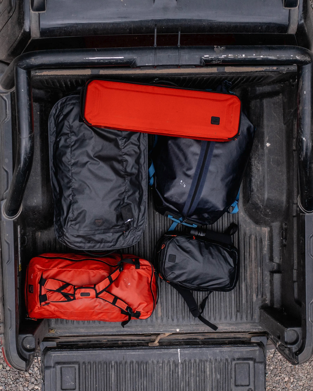 Simms 100L Tailwind Roller Bag with waterproof and abrasion-resistant design