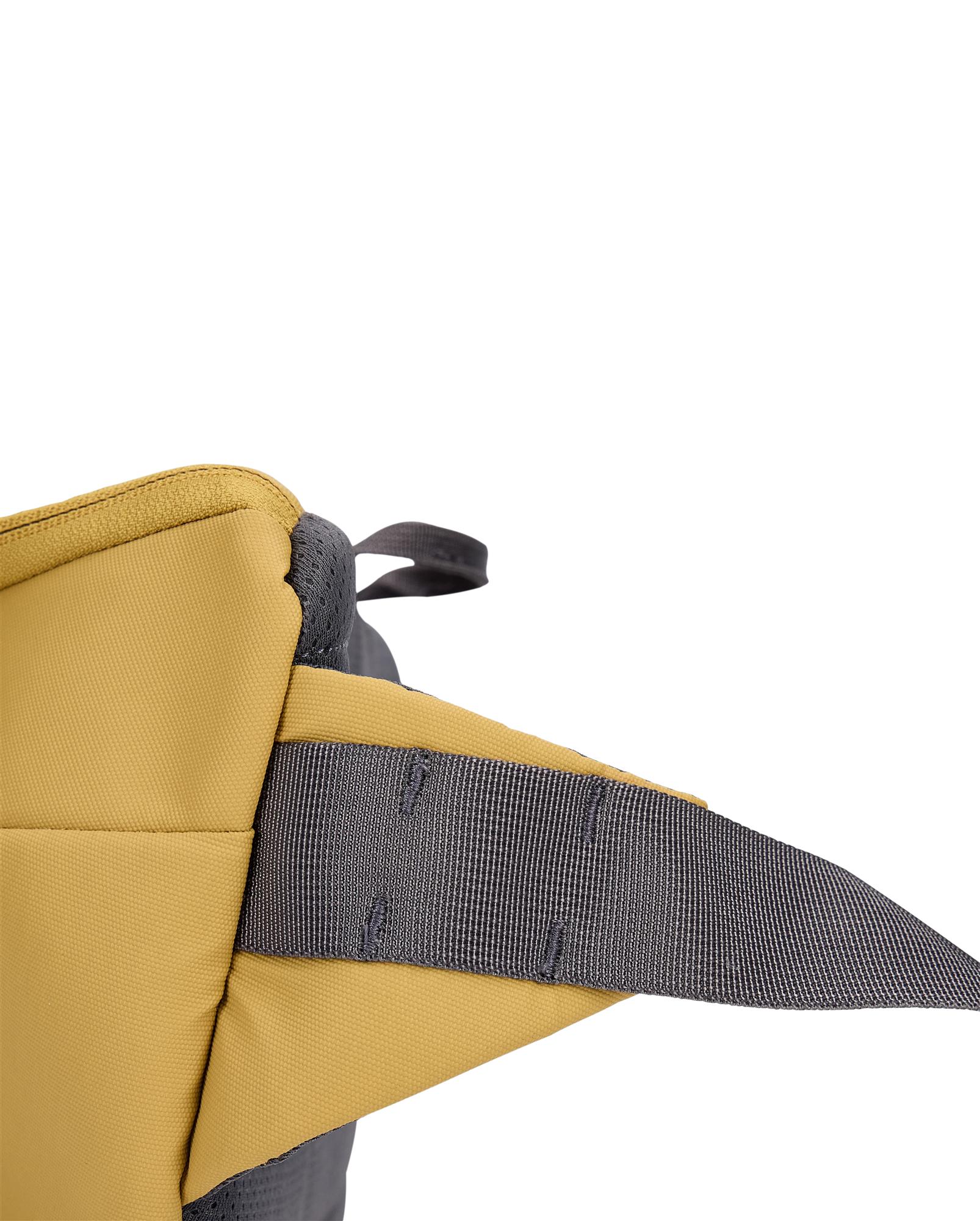 Close-up of Simms Tributary Hip Pack waist belt webbing loops for accessory attachment