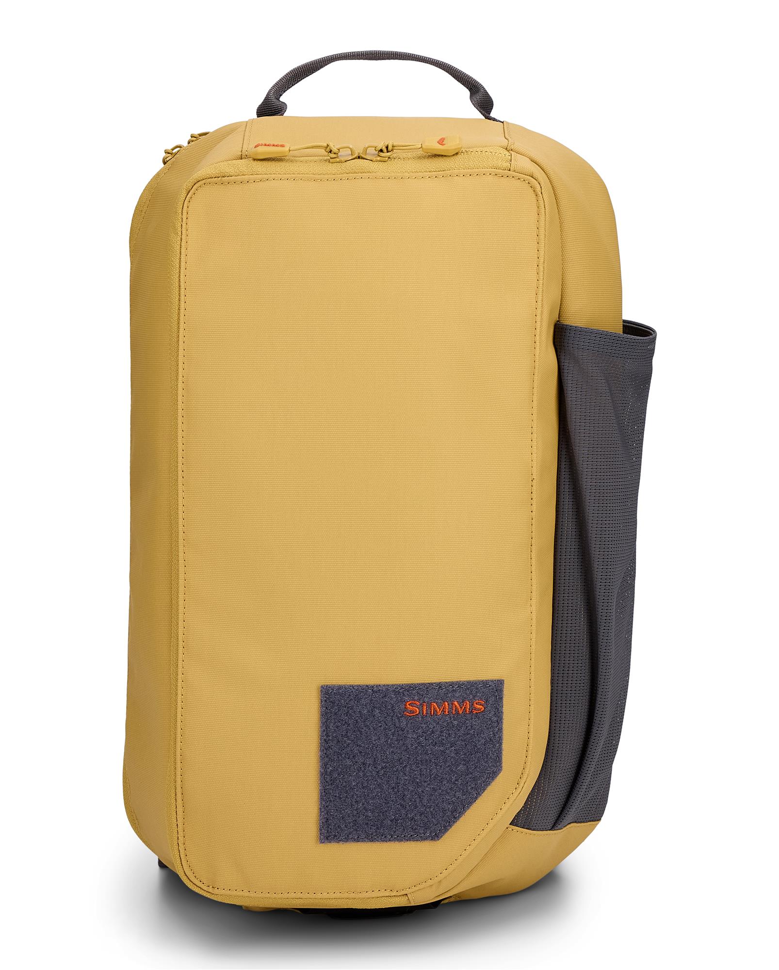 Simms Tributary Sling Pack main compartment open showing large capacity fly fishing gear storage