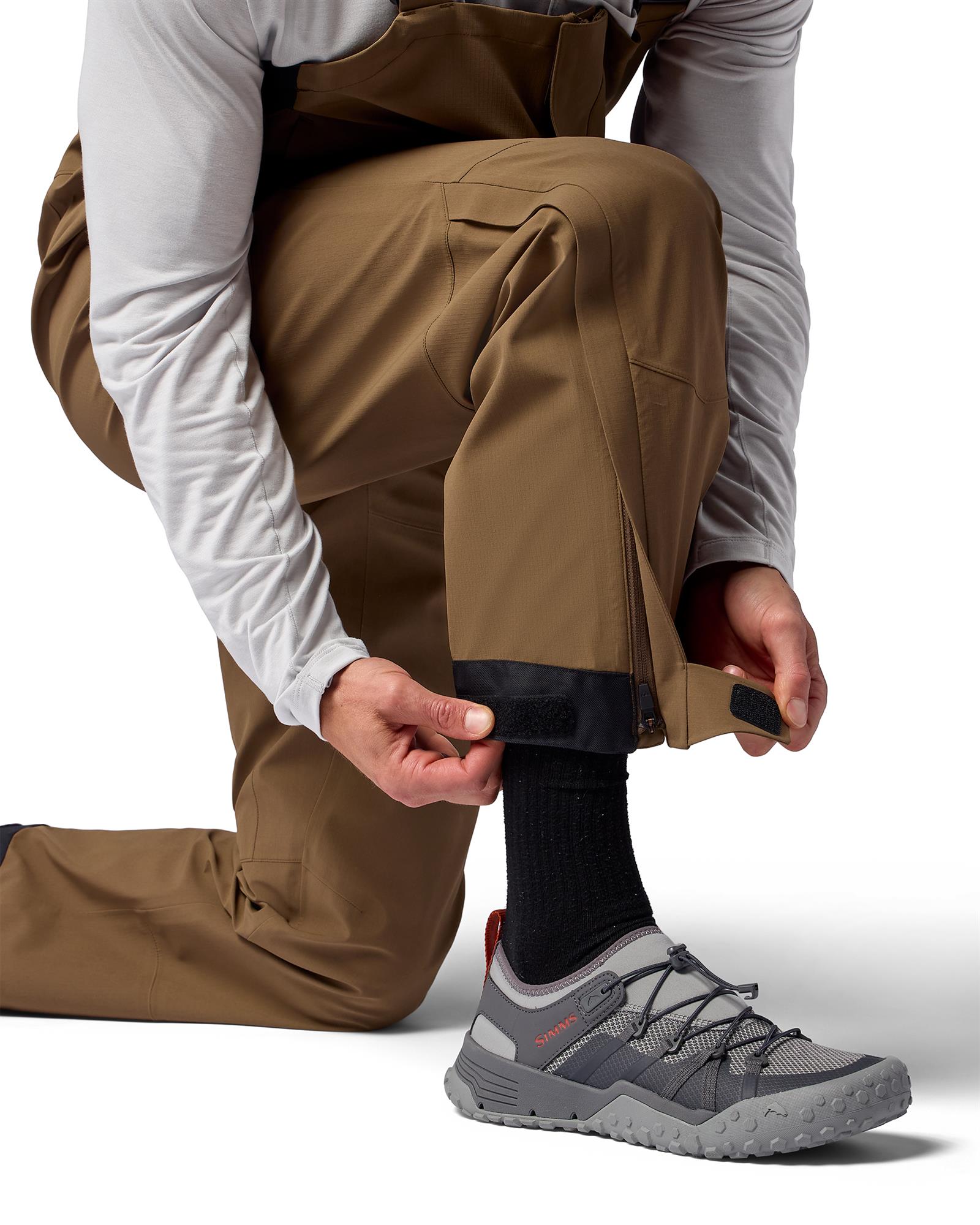 Simms Challenger bibs lower leg hem reinforcement with velcro strap and YKK zipper fishing rain gear