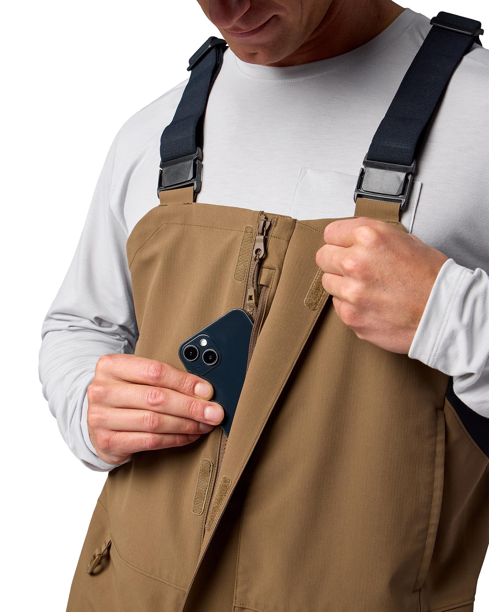 Simms Challenger bibs chest storage pocket waterproof front zipper storm flap detail