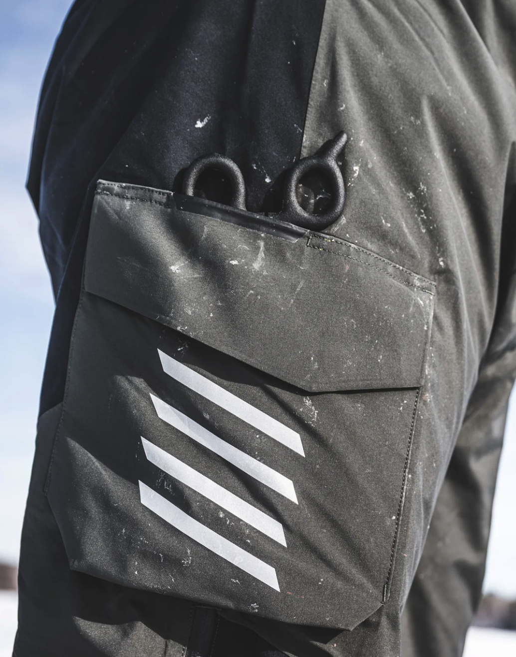 Waterproof Simms Challenger Insulated Bib keeps anglers dry in wet conditions.