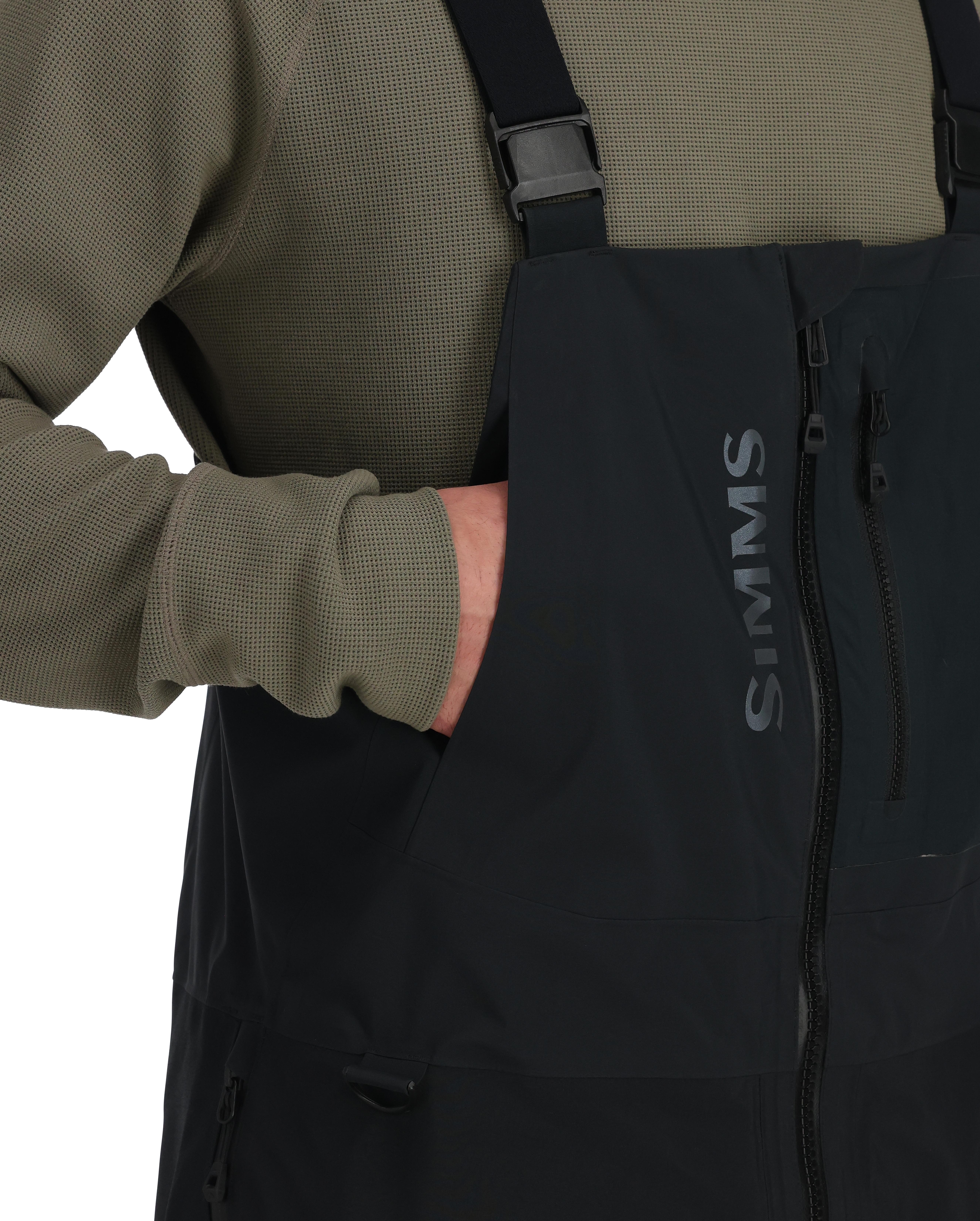 Model showing chest pocket on Simm's ProDry Fishing Bibs