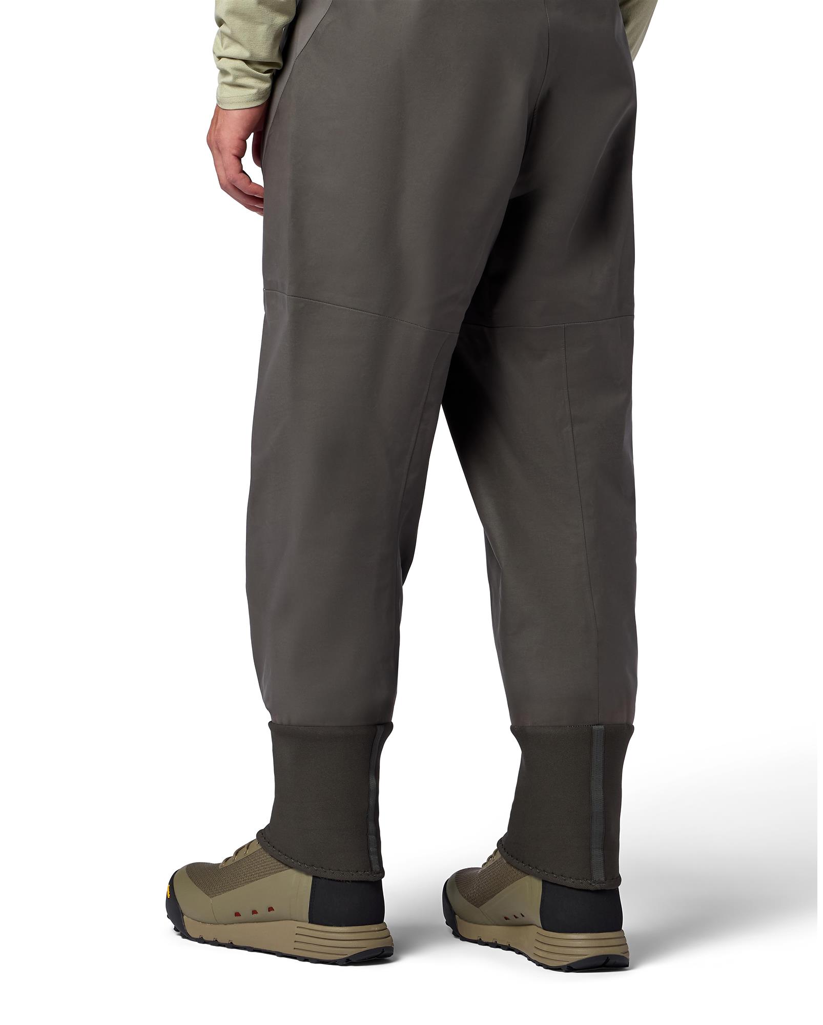 Back view of Simms Access Wading Boots paired with waders, ideal for mobile fly fishing anglers