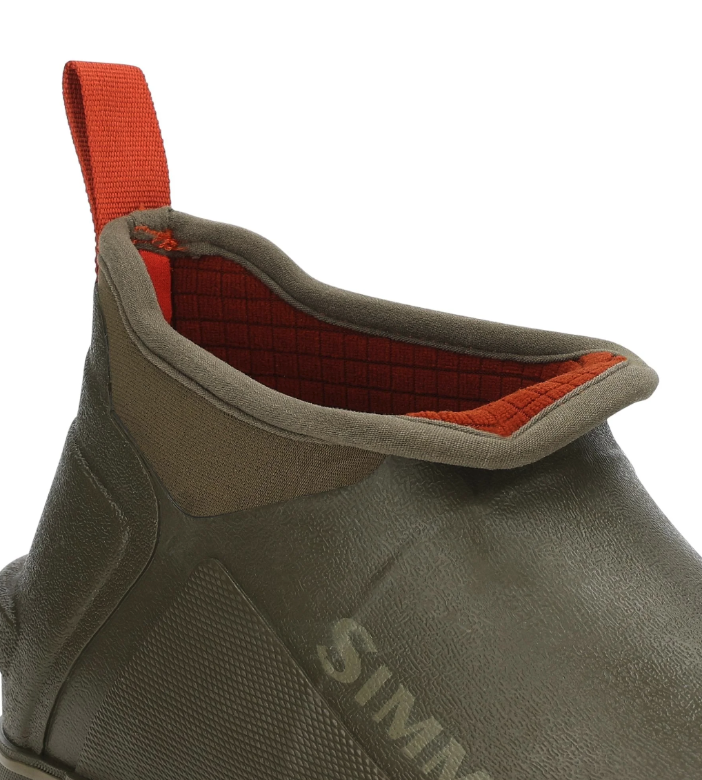 Detailed view of the slip-on design of Simms Challenger fishing shoes, highlighting their easy on-off feature.