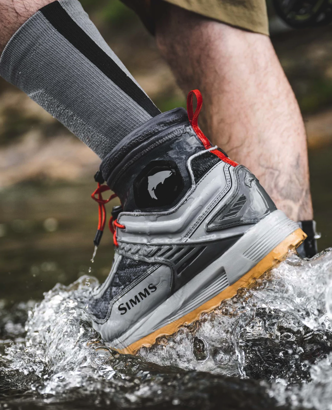 Order Simms Flyweight Wet Wading Shoe, high-top design with adjustable gasket seal for sand protection.