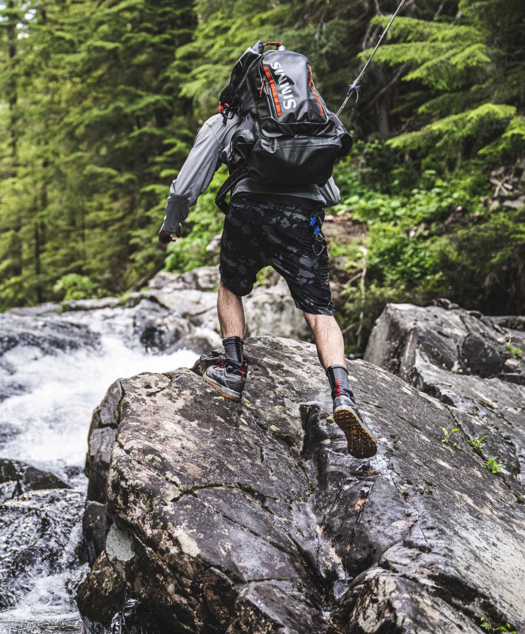 Simms Flyweight Wading Shoe with quick-adjust lacing and lace garages, perfect for fishing, available now.