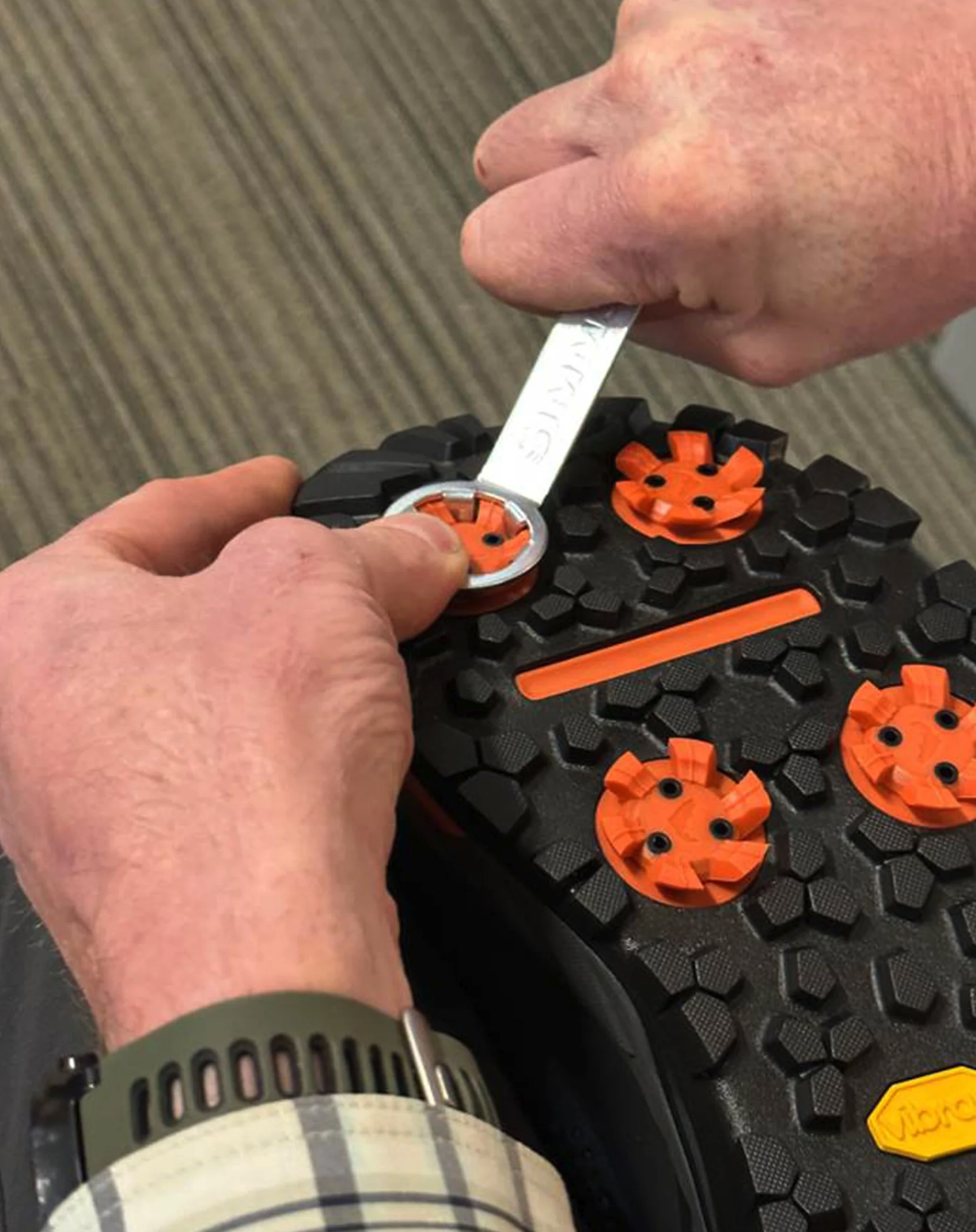 High-performance Simms G4 Powerlock Boots with Vibram sole for wet rock stability.