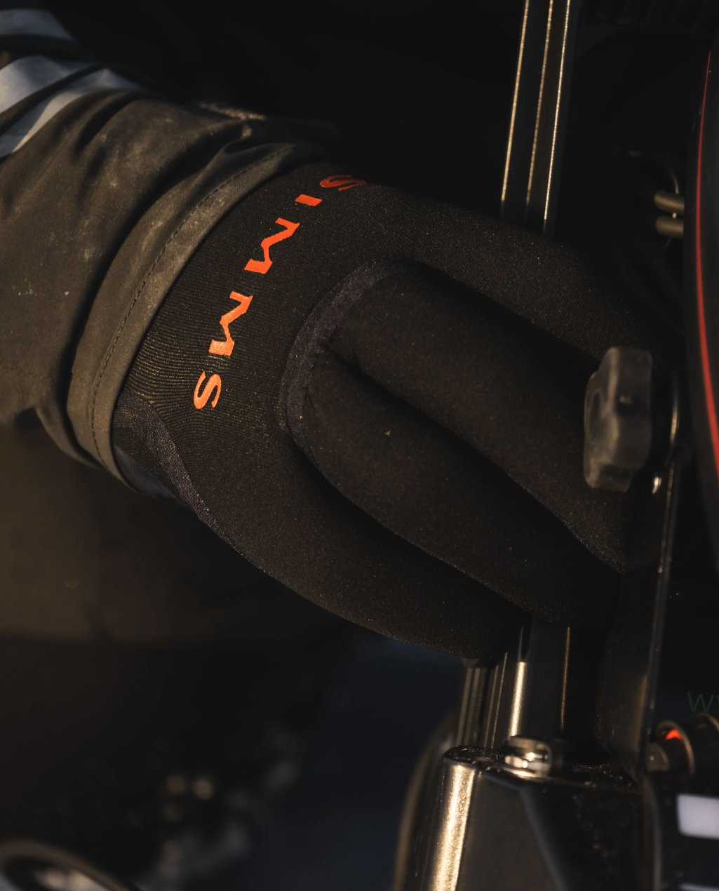 High-performance Simms ExStream Neoprene Fishing Gloves designed for durability and comfort.