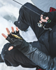 Ice angler holding perch on Simms Windstopper Half-Finger Fishing Glove