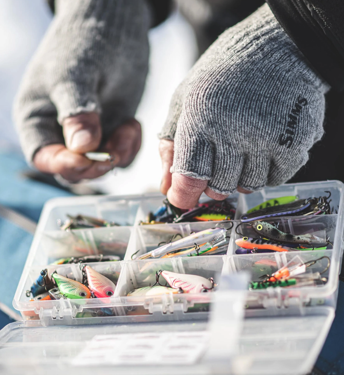 Insulated wool gloves from Simms, ideal for cold-weather fly fishing with added dexterity.