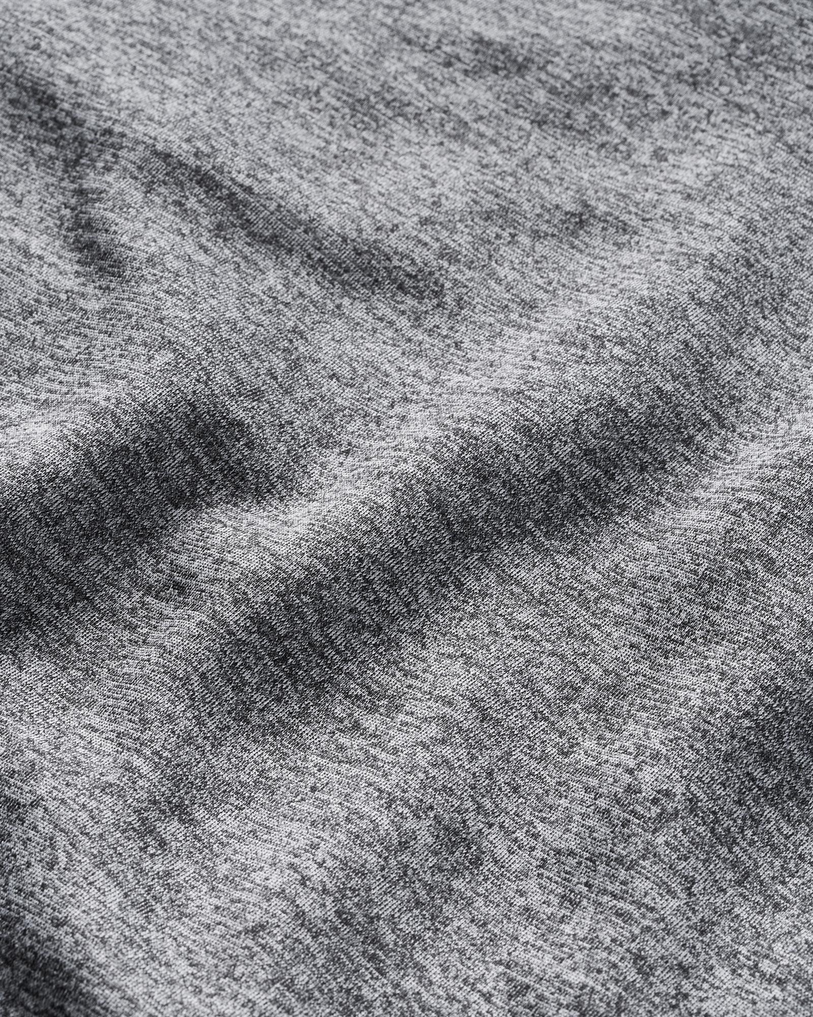 1. Simms Challenger fishing hoodie close-up of textured moisture-wicking fleece fabric