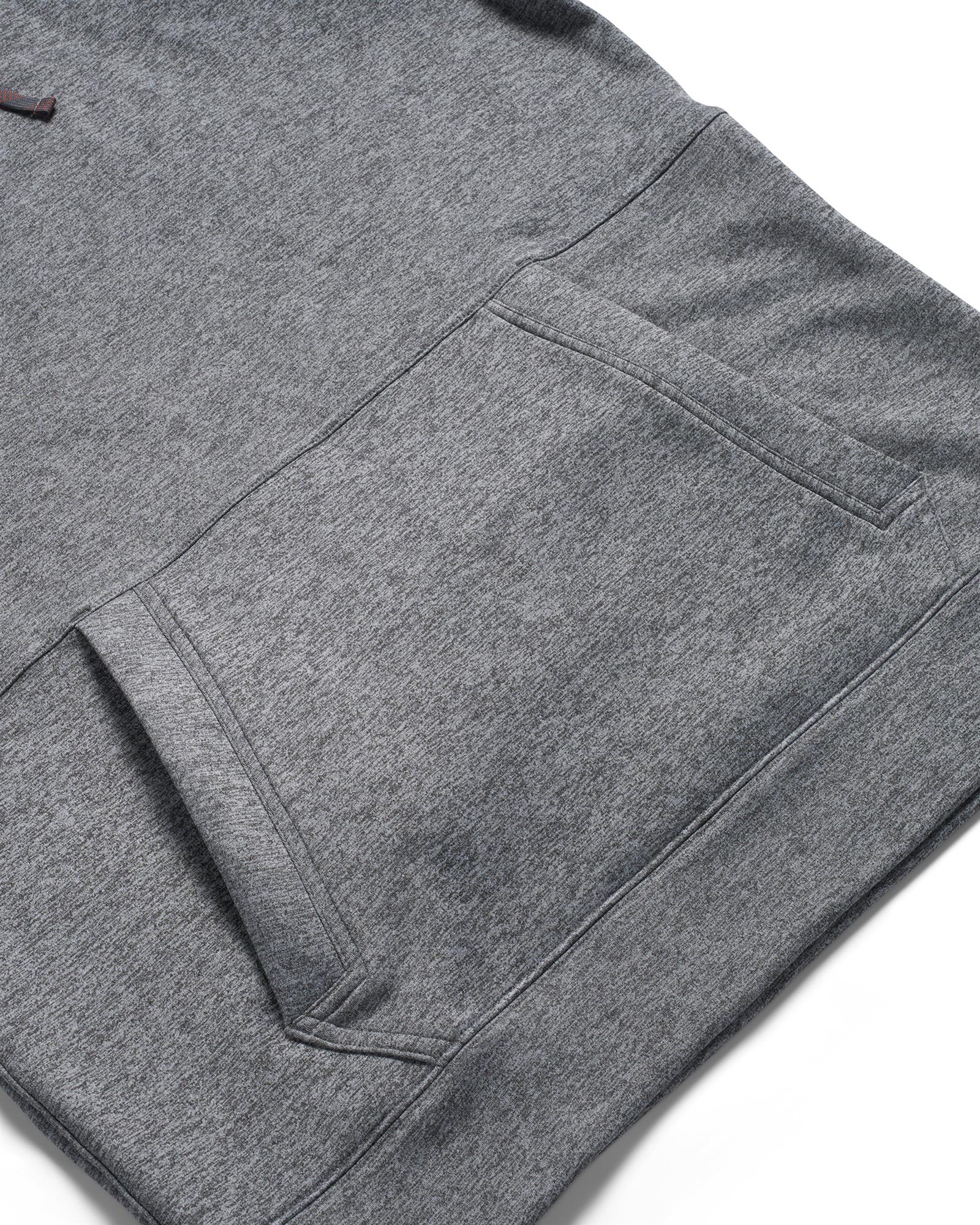 Simms Challenger Hoody kangaroo pocket close-up on a heather gray fleece fishing pullover