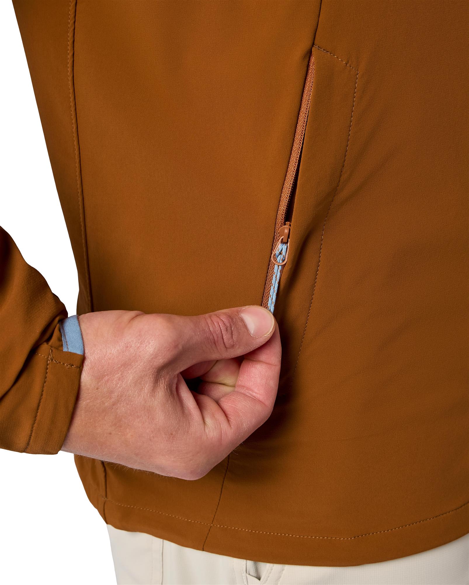 oncealed zip hand pocket on Simms Rogue Flex Half-Zip, streamlined fishing jacket storage