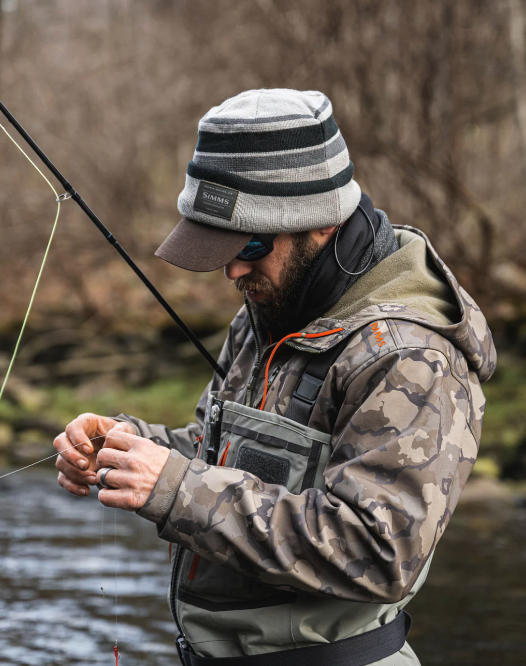 Simms performance hoody designed for warmth and versatility.