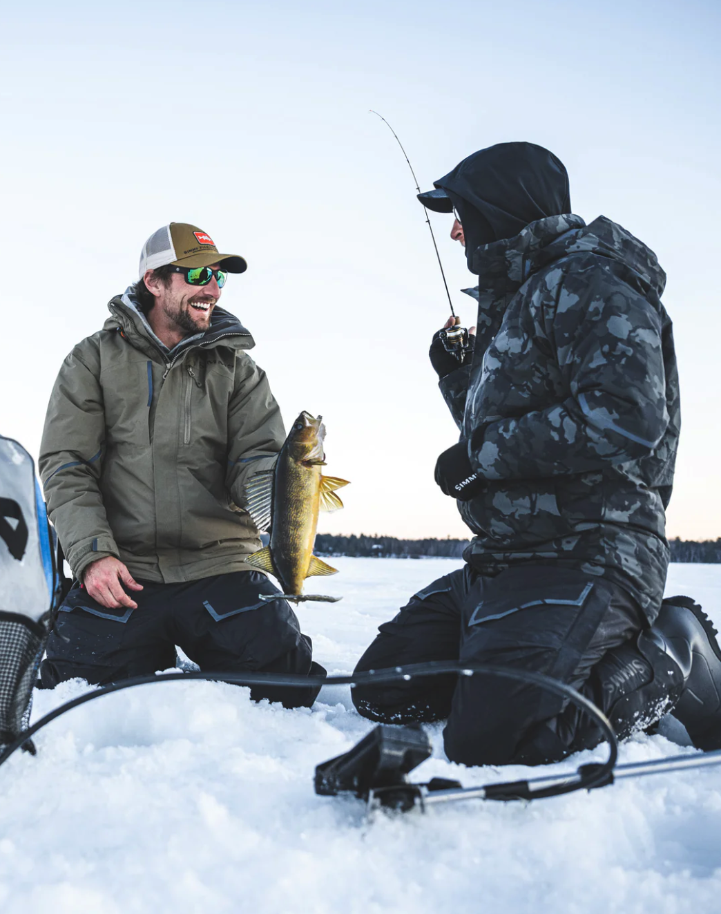 Simms Insulated Fishing Jacket with durable water-repellent finish.