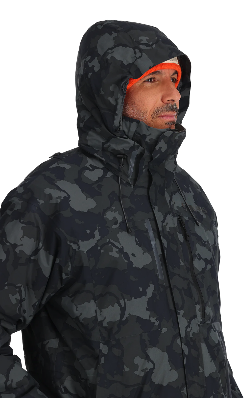 Simms fishing jacket with internal chest pocket for secure gear storage.