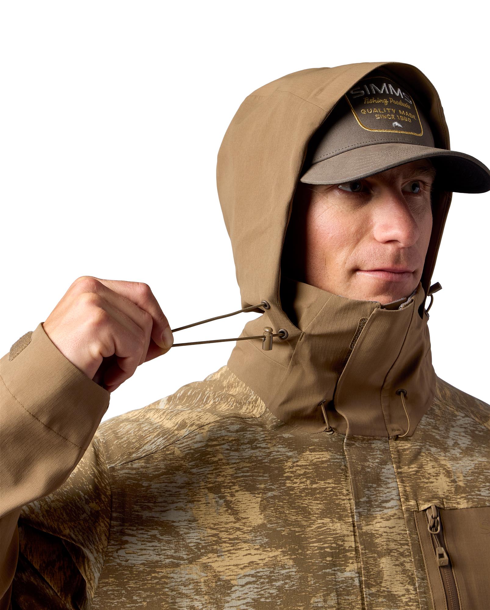 Simms Challenger waterproof fishing jacket adjustable storm hood drawcord system