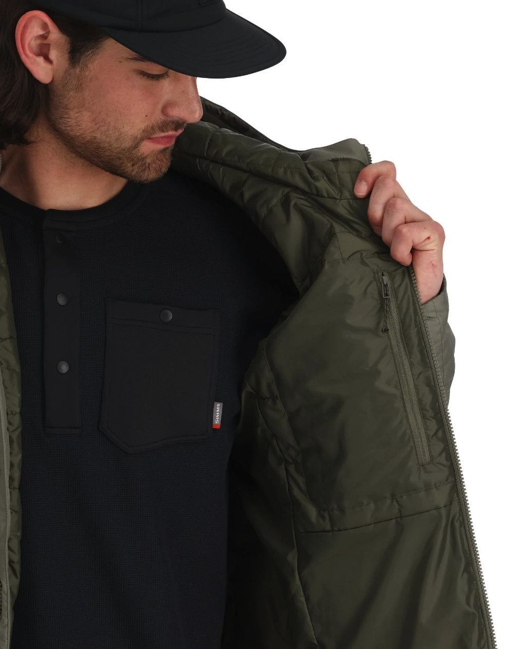 Durable Simms Fall Run Hoody with PrimaLoft insulation for cold weather fishing.