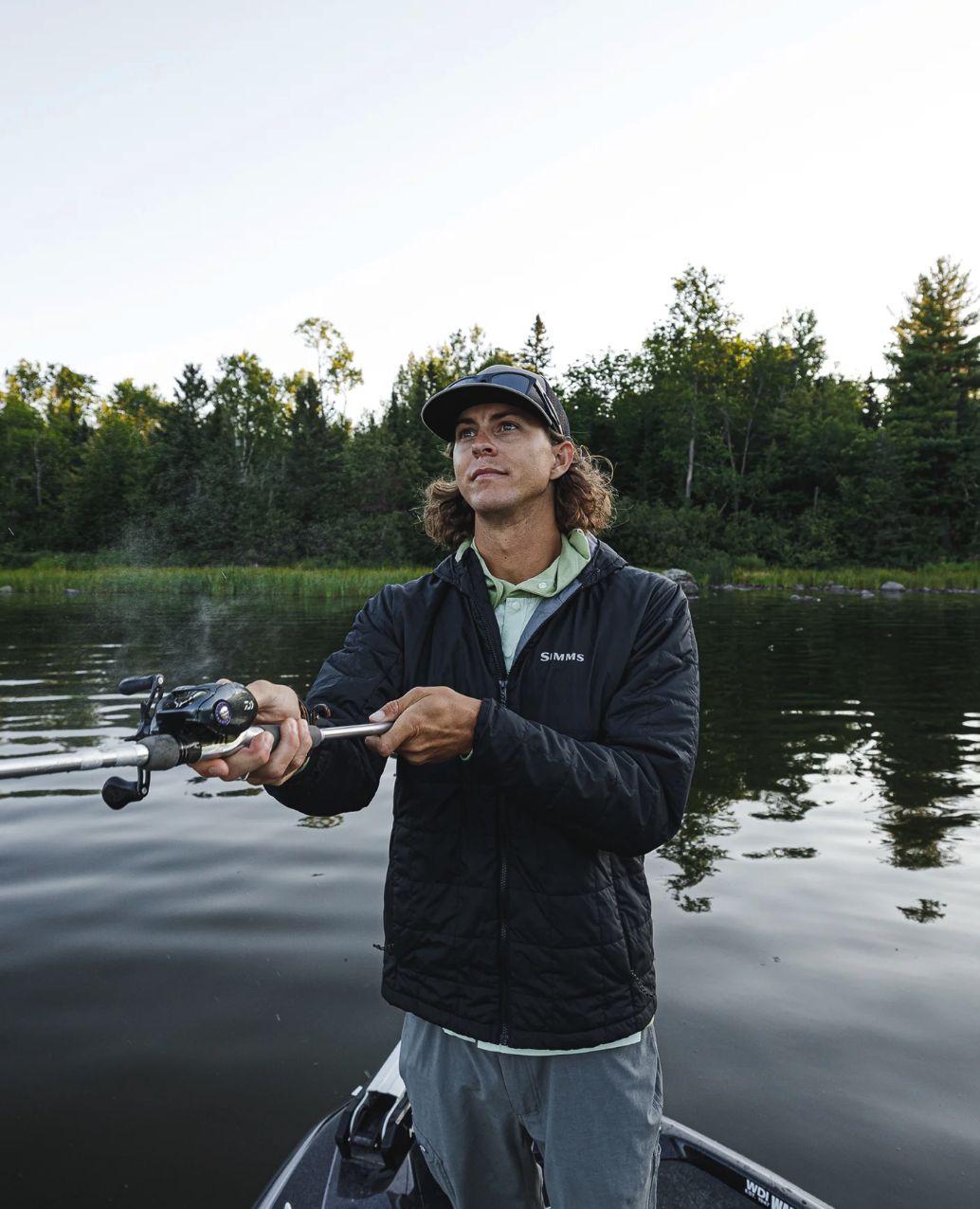 Simms insulated jacket with an adjustable hood for added protection.