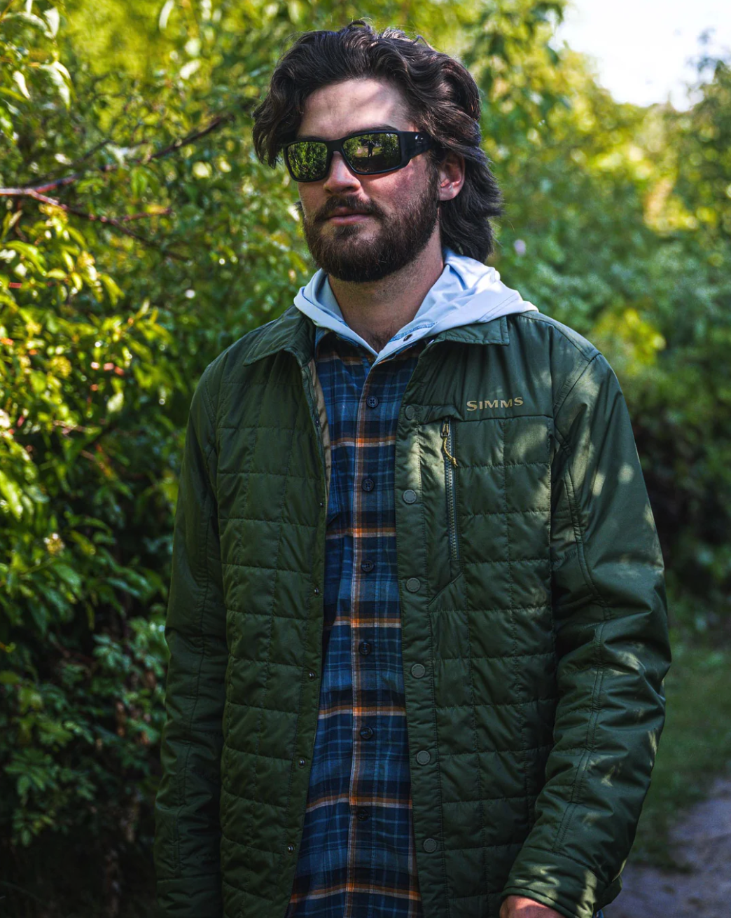 Water-resistant Simms Fall Run Hybrid Shacket with quilted design.