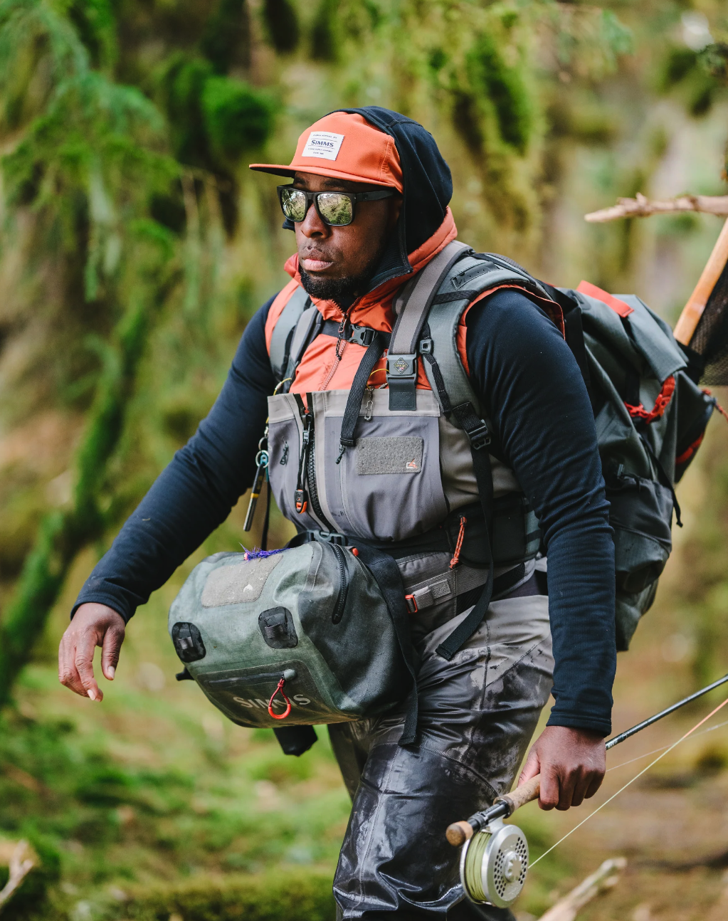 Men's Fall Run Insulated Vest by Simms - ideal for layering with its sleek and insulating design