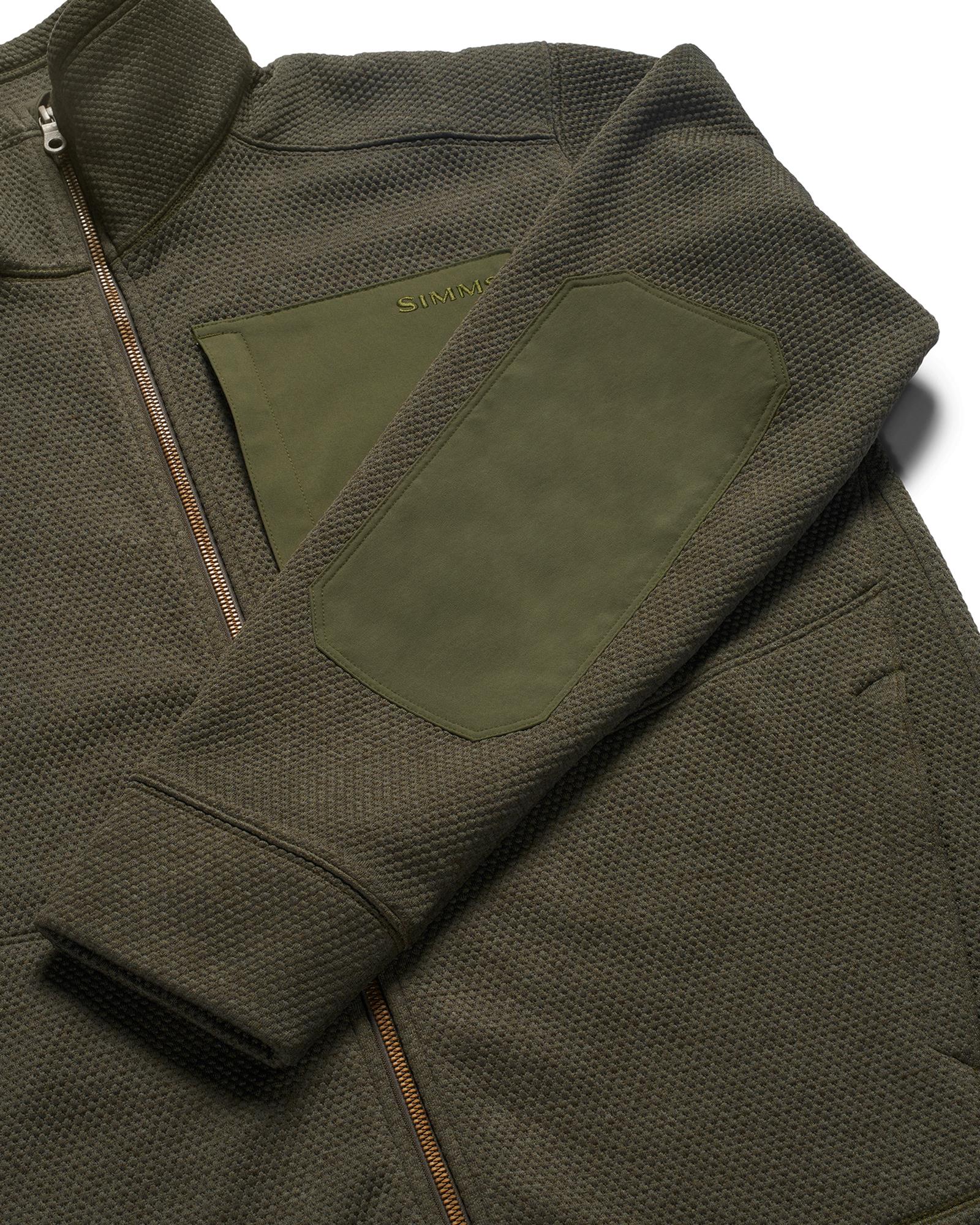 1. Simms Harbor Fleece close-up of nylon-blend elbow reinforcement on a heavyweight fishing fleece jacket