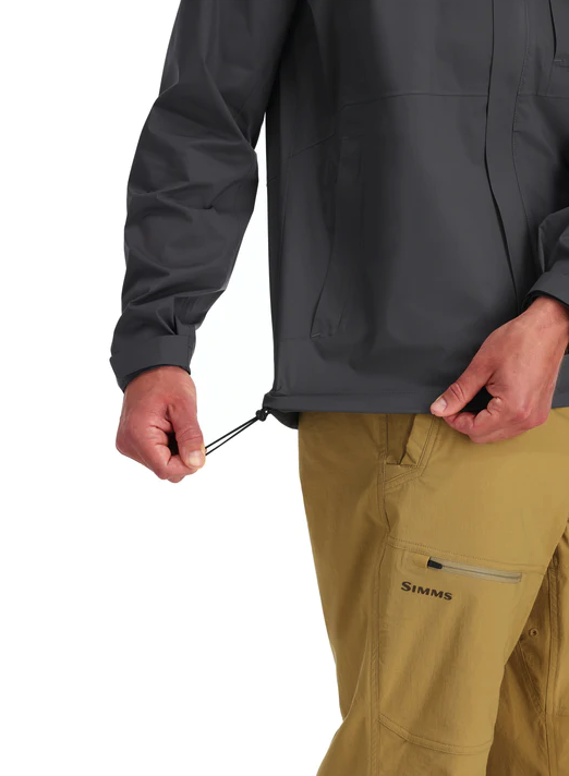 Durable Simms fishing rain jacket for hiking and fishing.