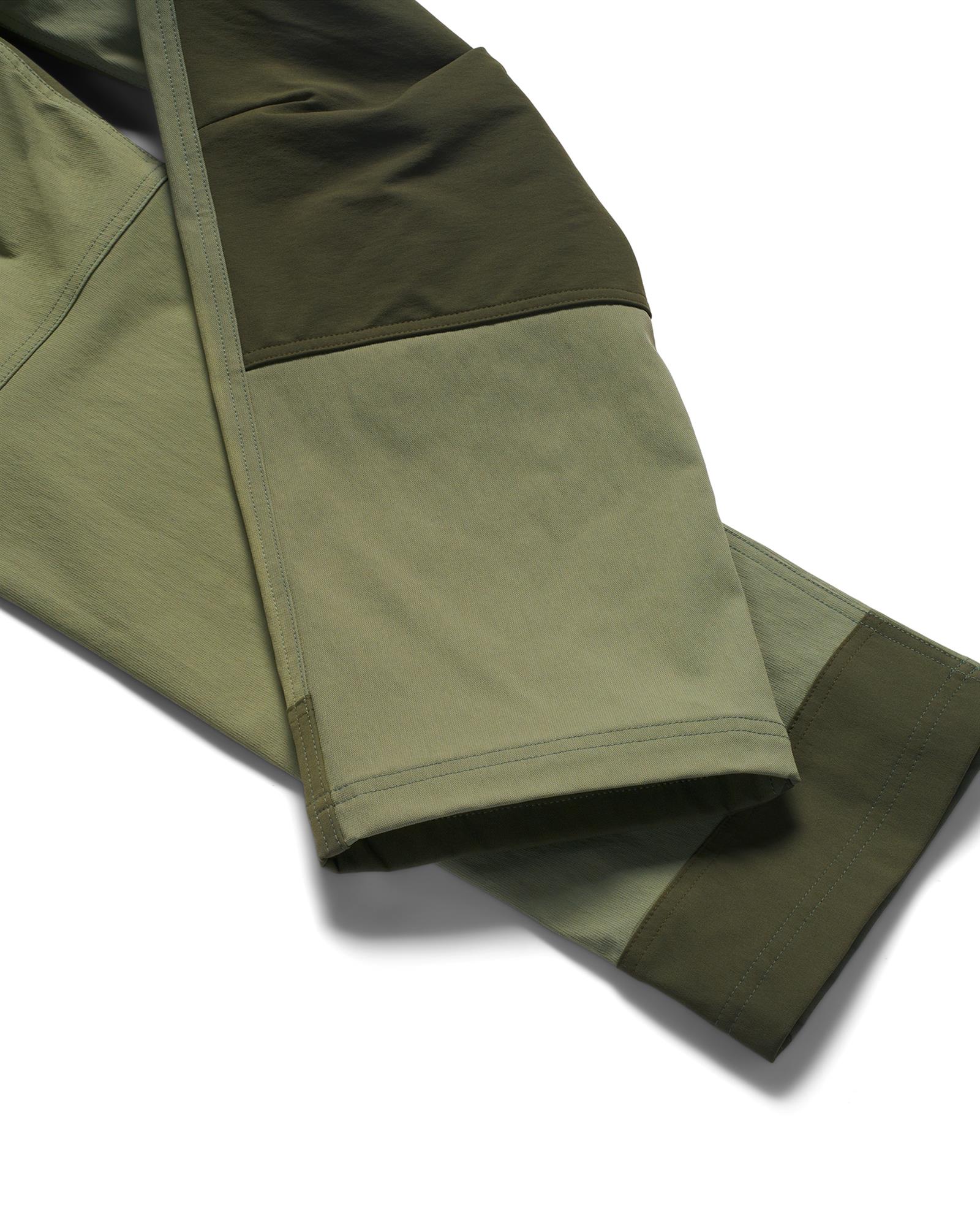 Men’s outdoor fishing pants with abrasion-resistant reinforced hems for boots and rough terrain