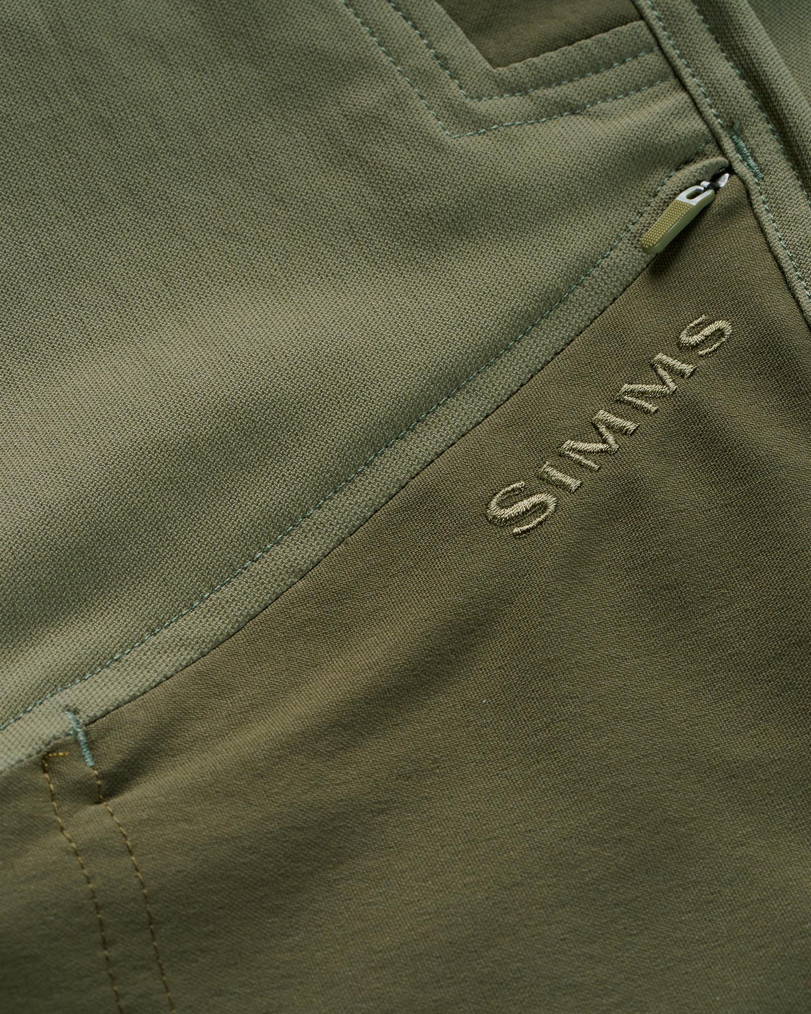 Men’s technical outdoor pants with zippered thigh pocket for hiking hunting and camping essentials