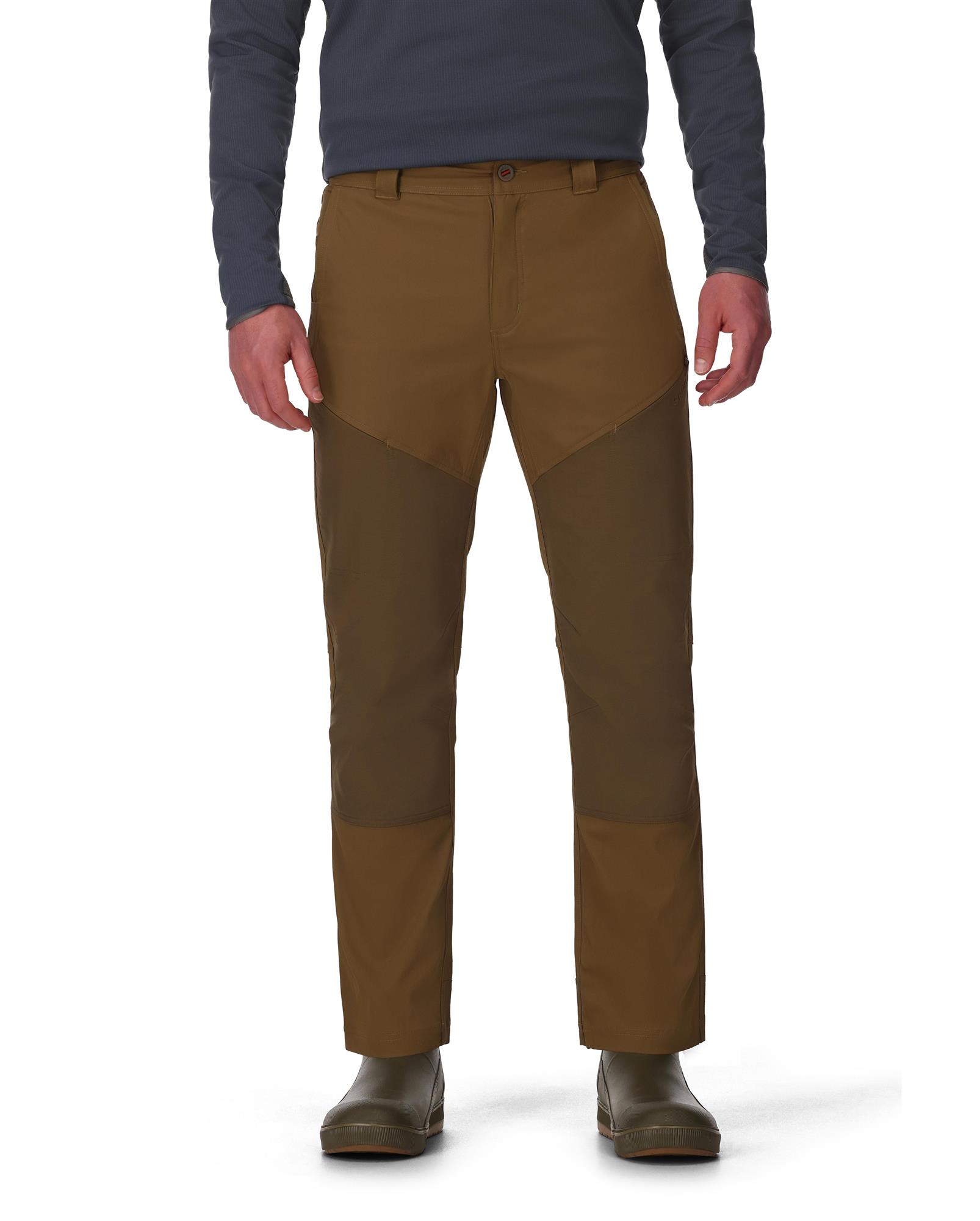 Men’s Simms Confluence fishing pants with reinforced knees and articulated mobility for rugged terrain
