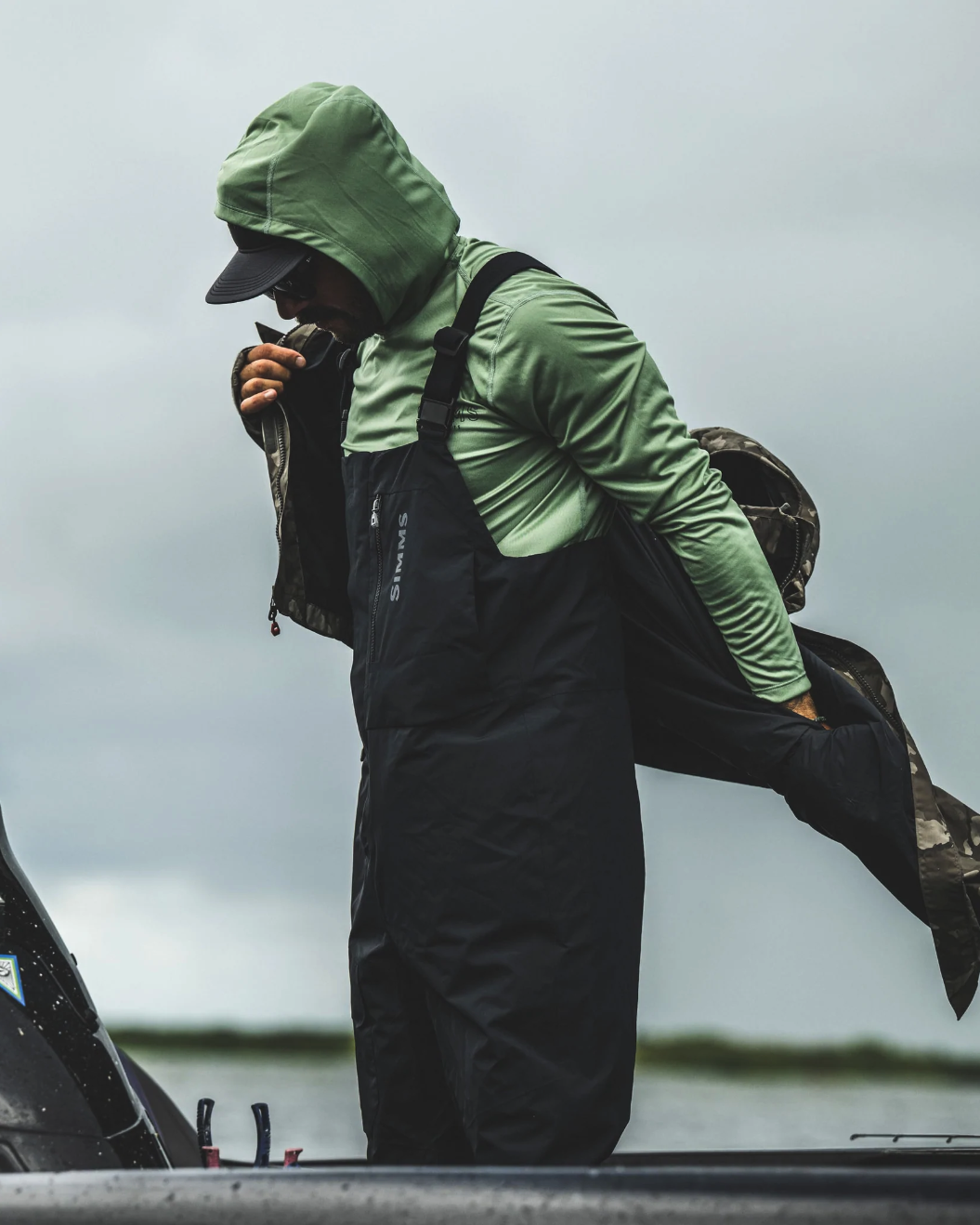 Angler-ready Simms Challenger Bibs keep you dry in wet weather conditions.