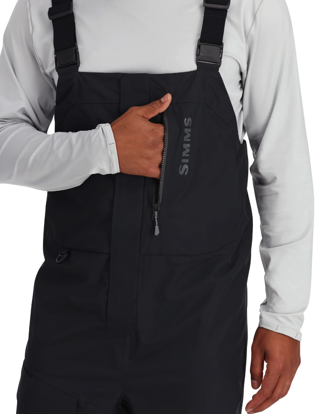 Adjustable waist on Simms Challenger Bibs for a secure fit during active fishing.