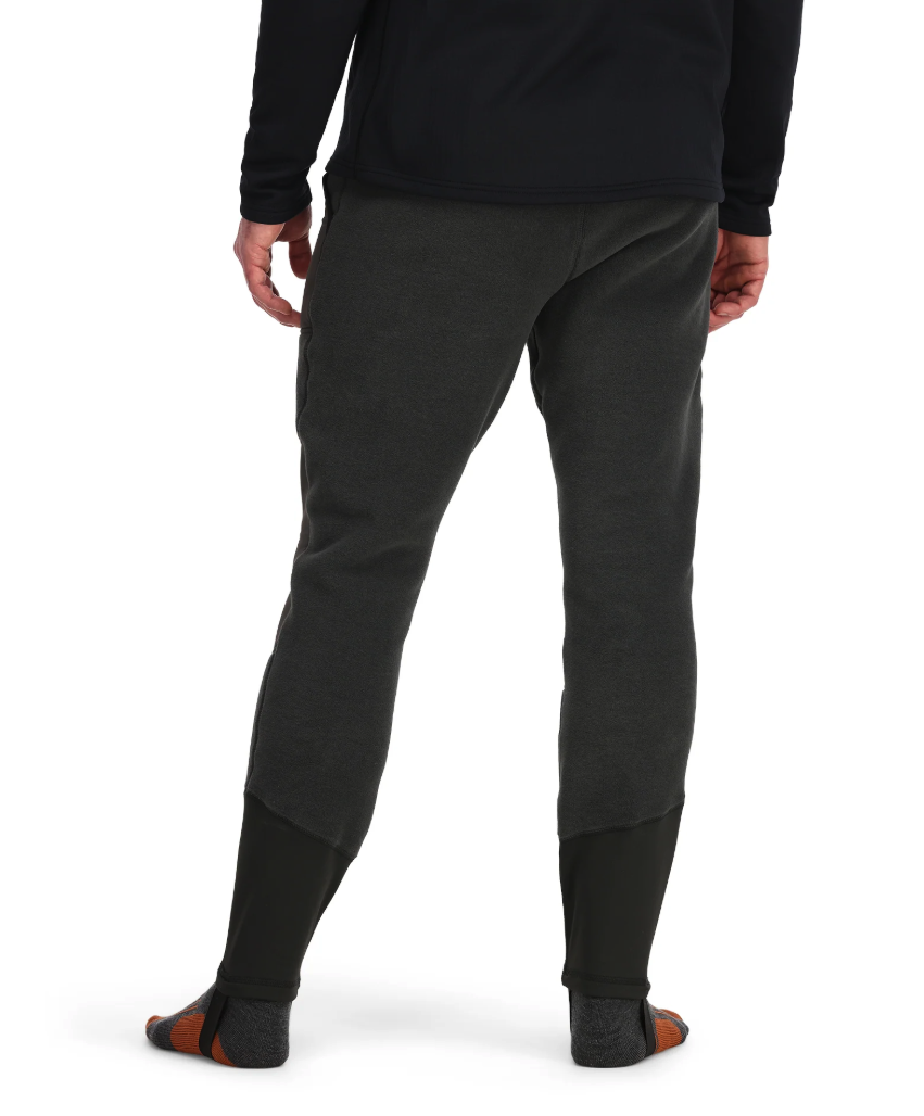 Rear view of model wearing Simms Fjord Pants