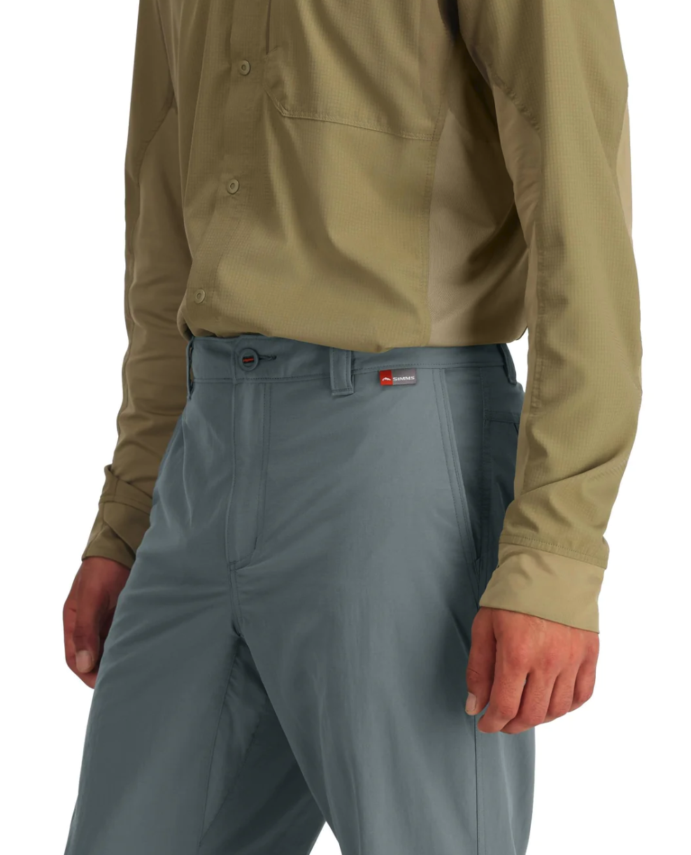 Simms Superlight Pant with zippered pockets for secure storage.
