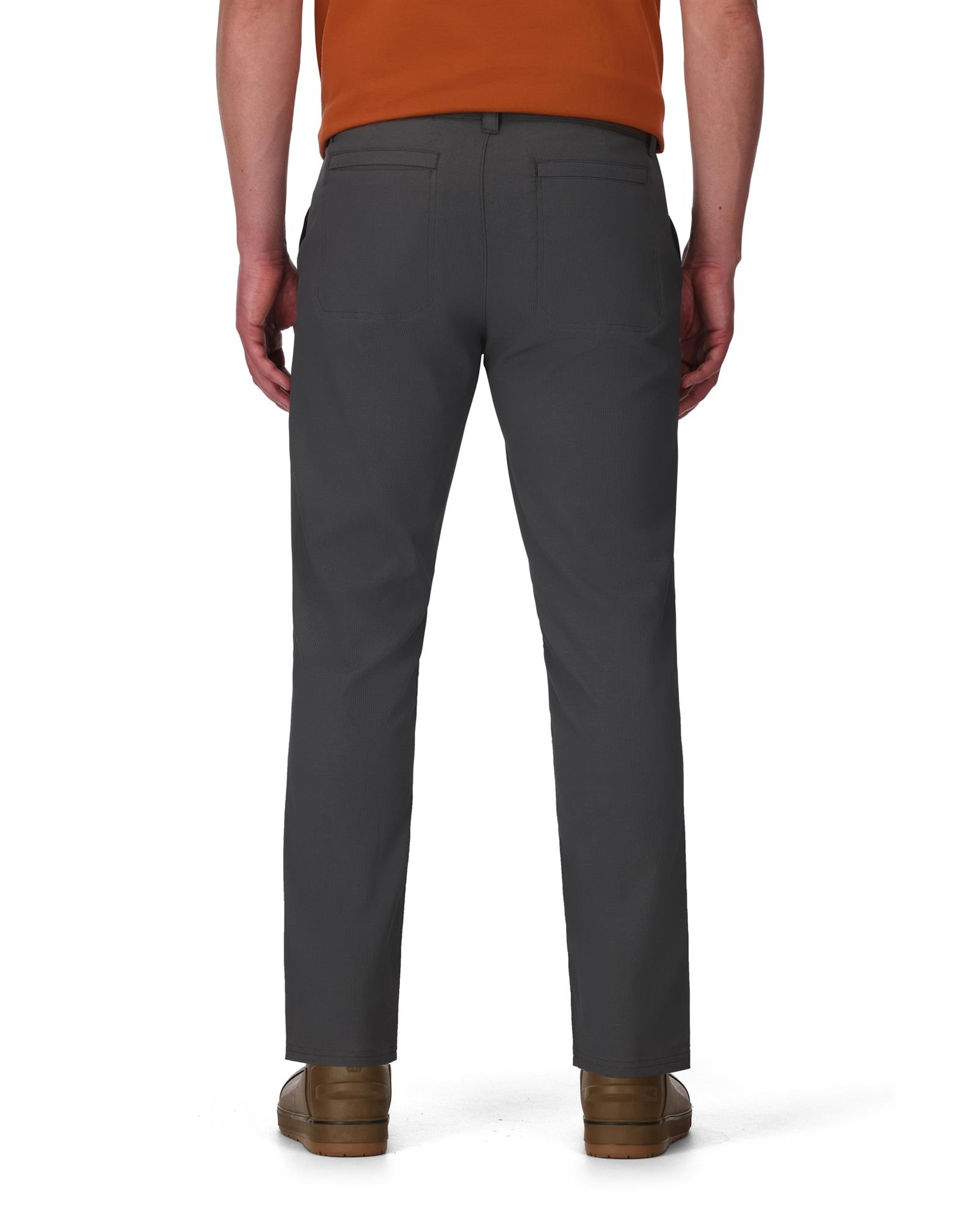 Back view of Simms Wanaka Pant in slate gray outdoor fishing pants