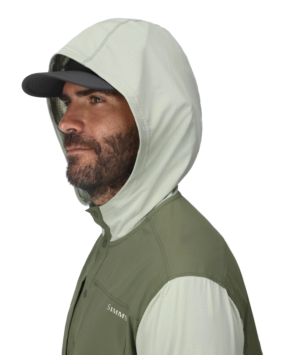 Model with hood up on Simms Latitude BiComp Hoody
