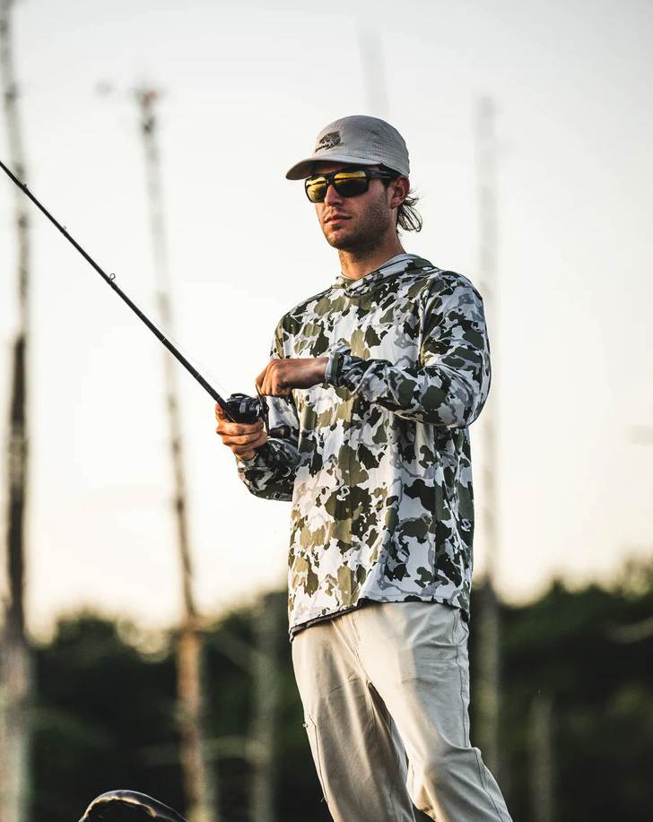 Protect yourself from harmful UV rays with Simms SolarFlex Hoody.