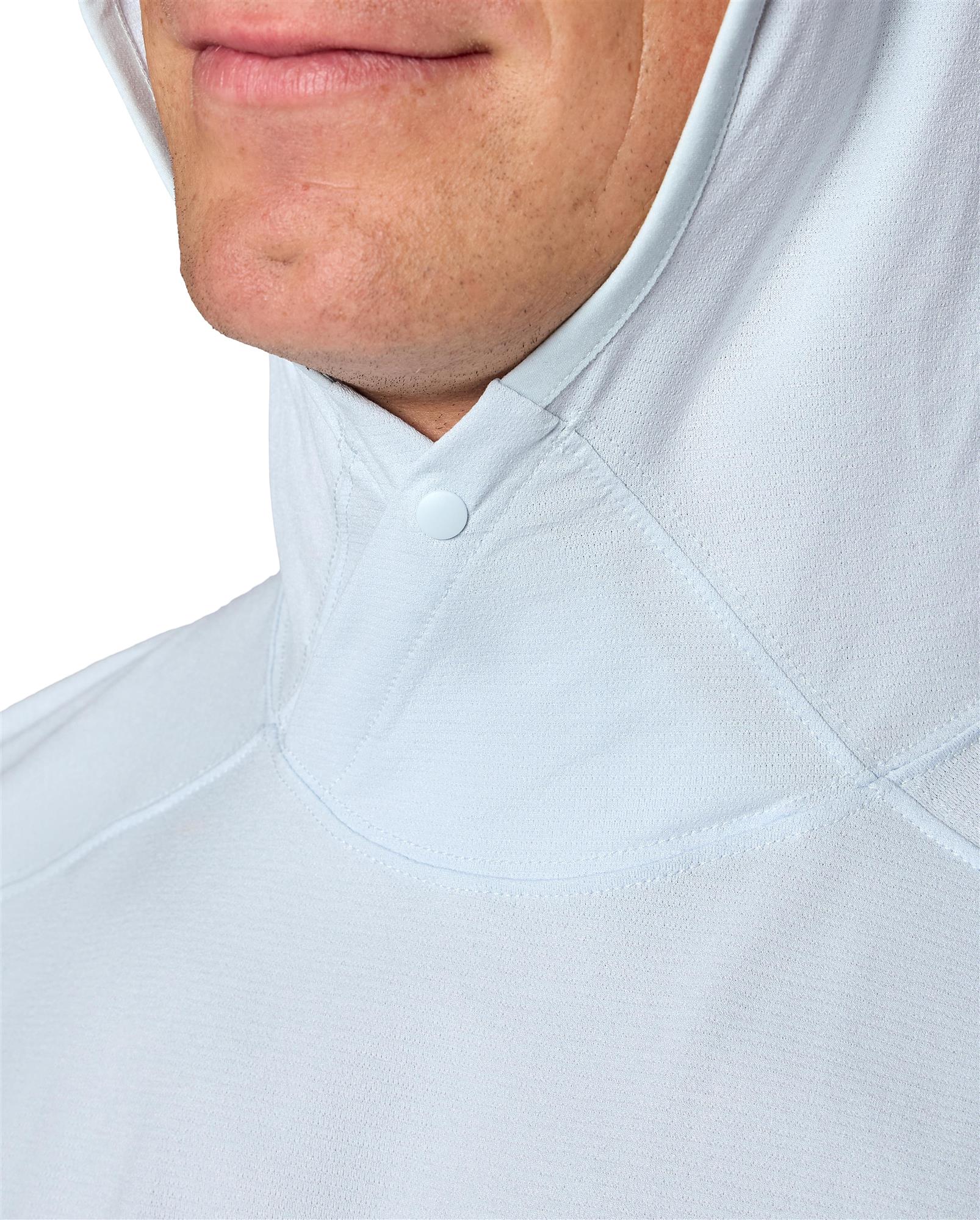 Close-up Simms SolarFlex Hoody vented hood snap closure detail – fishing sun protection