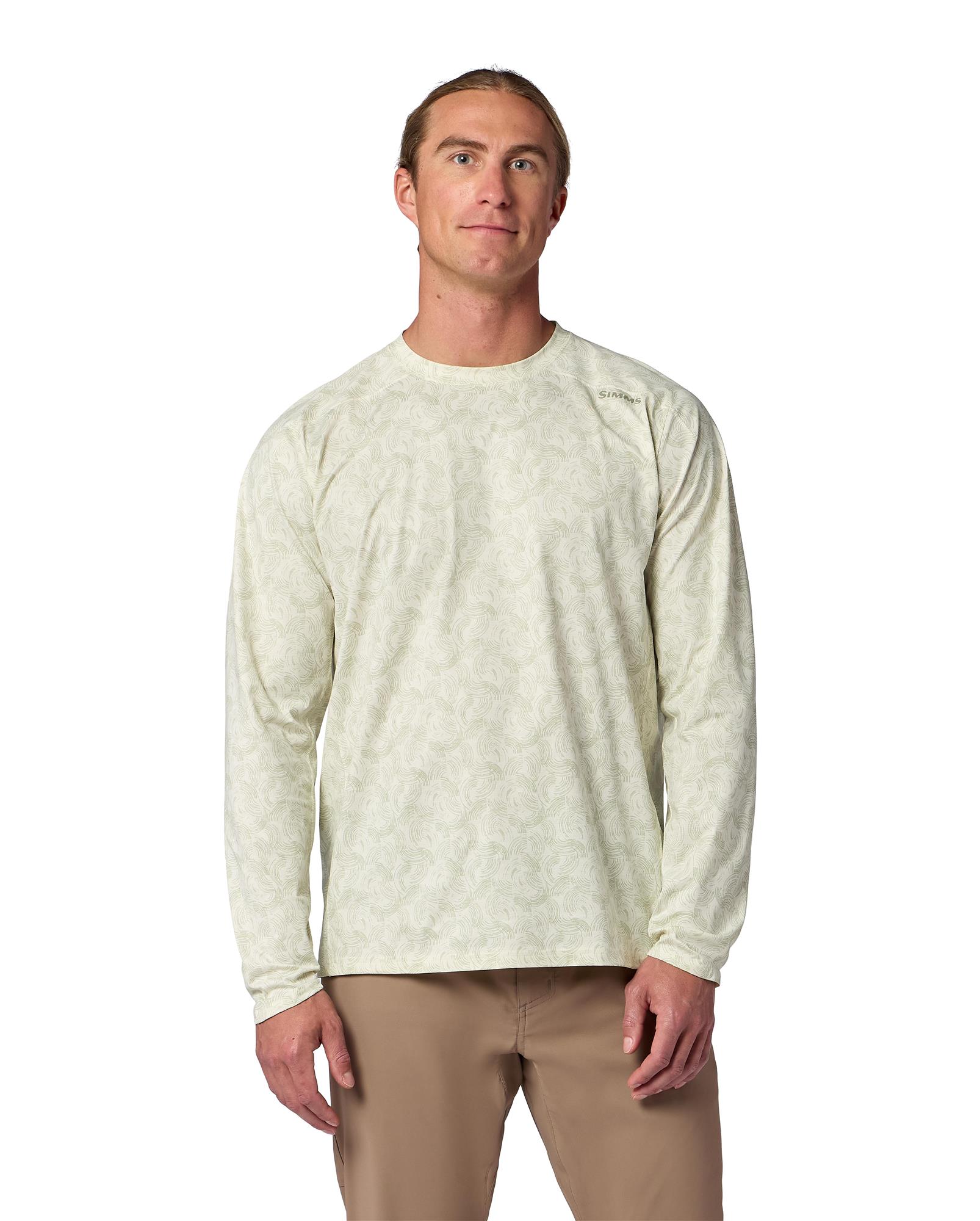 Model wearing Simms Solarflex Crewneck UPF 50+ long sleeve fishing sun shirt – front view