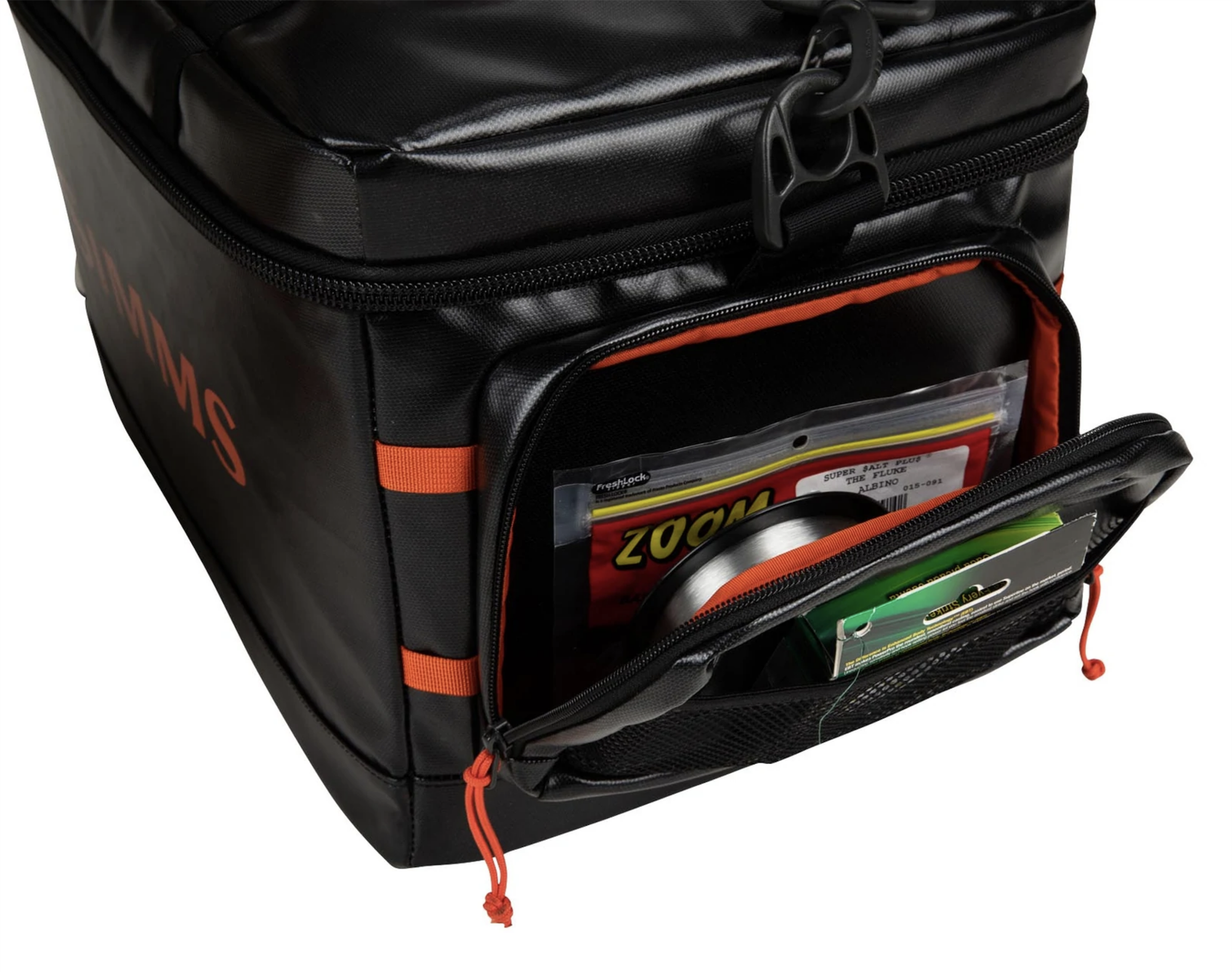 Simms Stash Bag with padded, removable shoulder strap and burly rubber handle for versatile carry options.