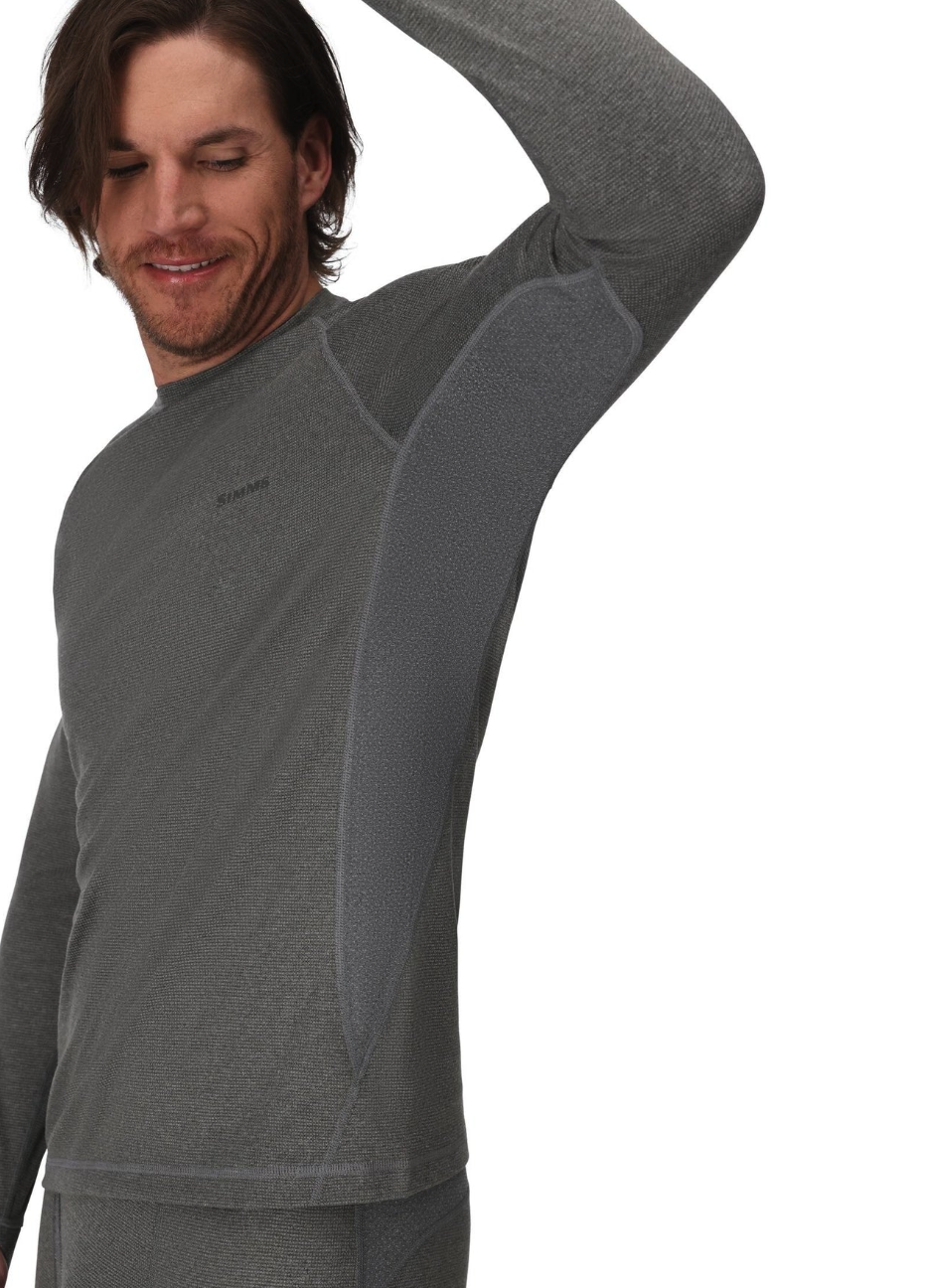 Underarm detail of model in Simms Strata 160 Baselayer LS Crew