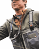 Man wearing waders and Simms Strata 330 Half-Zip Midlayer Hoody