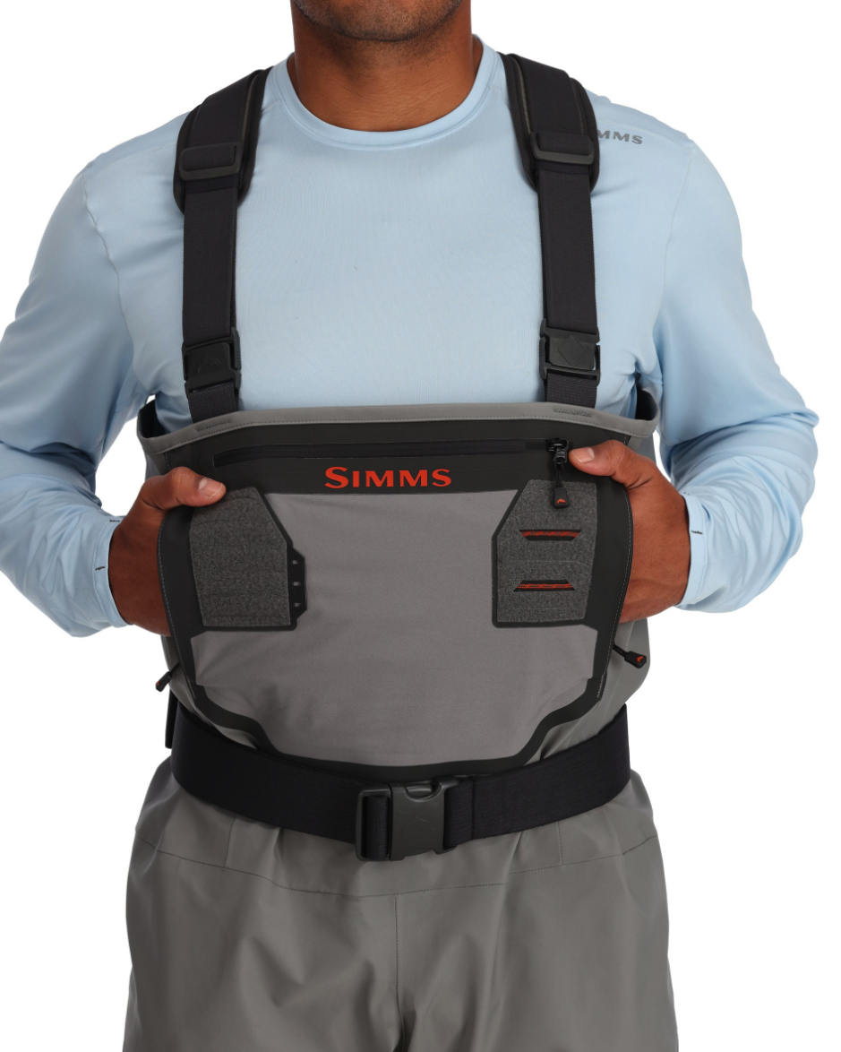 Simms Confluence Waders with fleece-lined hand-warming pocket and zippered chest storage