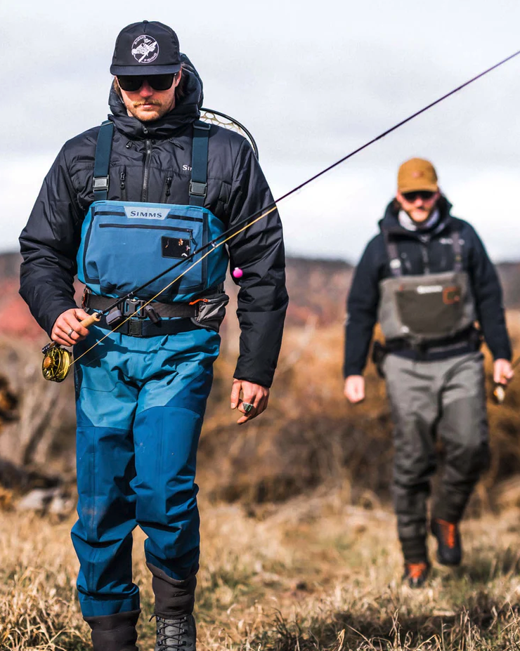 Top access chest storage pocket with micro-fleece lined hand-warmer pockets in Simms Freestone Waders