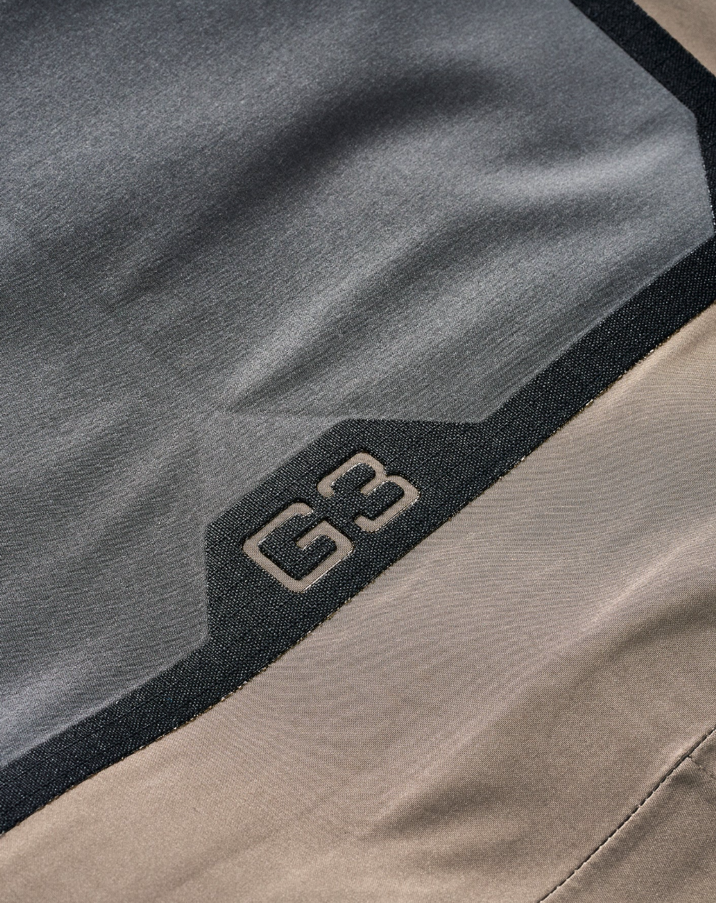 Simms G3 Pro Guide GORE-TEX fishing waders showing G3 logo and reinforced waterproof fabric construction