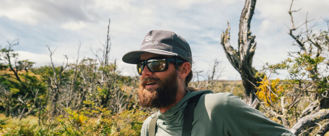 Angler wearing Skwala Icon Rope Hat in slate color